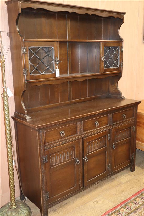 A modern panelled oak dresser W.137cm